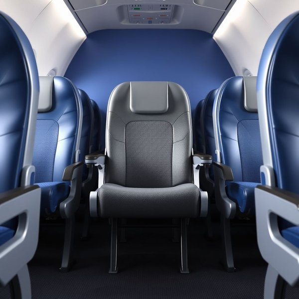 Ein leerer middle seat im Flugzeug, zwischen einem Fenster- und einem Gangplatz.