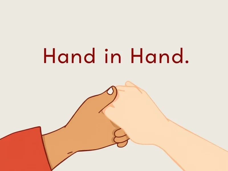 Image: Two hands clasped together, illustrating the concept of "Go Hand In Hand"